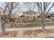 Home with multi-level terraced front yard and mature trees visible at 3127 And 3125 N Raleigh St, Denver, CO 80212