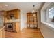 Well-appointed kitchen with stainless steel appliances, wood cabinets, and hardwood floors at 3127 And 3125 N Raleigh St, Denver, CO 80212