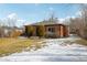 Spacious backyard with winter grass and snow, perfect for outdoor activities and relaxation at 3630 N Saint Paul St, Denver, CO 80205