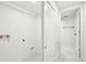 Bright laundry area with tile flooring and convenient storage cabinets at 3630 N Saint Paul St, Denver, CO 80205