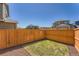 Fenced backyard featuring grass, mulch and gravel landscaping at 11709 Park South Ln, Parker, CO 80138