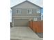 Well-maintained home featuring a two-car garage and fenced backyard for added privacy at 11709 Park South Ln, Parker, CO 80138