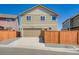 Exterior facade of a 2-story home featuring a 2-car garage at 11709 Park South Ln, Parker, CO 80138