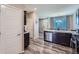 Open kitchen with stainless steel appliances, granite countertops, and a dining area at 11709 Park South Ln, Parker, CO 80138