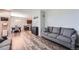 Spacious living area seamlessly connecting to the dining and kitchen spaces at 11709 Park South Ln, Parker, CO 80138