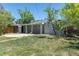 A spacious backyard features a large patio and a covered porch at 967 Victor St, Aurora, CO 80011