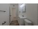 Bright bathroom featuring a modern vanity and classic fixtures at 967 Victor St, Aurora, CO 80011