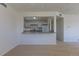 Spacious living room area leading into kitchen with lots of natural light at 967 Victor St, Aurora, CO 80011