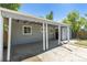 A covered patio offers an outdoor living space at 967 Victor St, Aurora, CO 80011