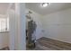 This utility room features updated wood-look flooring, white walls, and a new water heater at 967 Victor St, Aurora, CO 80011