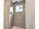 Bathroom shower with tiled wall and rainfall shower head at 3175 S Pennsylvania St, Englewood, CO 80113