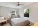 Comfortable bedroom with natural light and calming design at 3175 S Pennsylvania St, Englewood, CO 80113