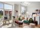 Inviting living room with ample natural light, a cozy seating area, and contemporary decor for a relaxing ambiance at 2518 N Washington St, Denver, CO 80205