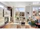 Inviting living room with ample natural light, a cozy seating area, and contemporary decor for a relaxing ambiance at 2518 N Washington St, Denver, CO 80205