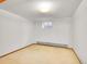 Cozy basement bedroom features a window and neutral carpet at 312 Meadow View Dr, Evergreen, CO 80439