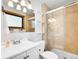Bright bathroom with a glass-enclosed shower, modern vanity, and neutral tilework at 312 Meadow View Dr, Evergreen, CO 80439