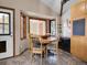 Cozy dining room area features a bay window and stylish seating, perfect for meals at 312 Meadow View Dr, Evergreen, CO 80439