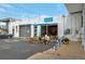 Street view of Glissade Coffee Company with outdoor seating, bicycle racks, and ample parking at 2080 Fulton St, Aurora, CO 80010