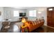 Cozy living room with hardwood floors, plenty of natural light, and stylish furnishings at 2080 Fulton St, Aurora, CO 80010