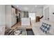 The open-concept layout seamlessly connects the living room and kitchen, perfect for entertaining at 690 S Newark Ct, Aurora, CO 80012