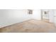 Spacious carpeted bedroom with a window allowing for natural light at 12940 W 75Th Ave, Arvada, CO 80005