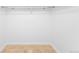Walk-in closet with a tile floor, lighting, and storage shelves at 12940 W 75Th Ave, Arvada, CO 80005