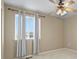 Bedroom with ceiling fan and window at 6404 Dry Fork Dr, Frederick, CO 80516
