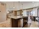Open floor plan with living room featuring hardwood floors and lots of natural light at 6404 Dry Fork Dr, Frederick, CO 80516