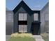 Modern two-story exterior with black trim, sleek lines, and professional landscaping at 789 E County Line Rd, Erie, CO 80516