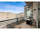 Outdoor balcony with a grill, offering a space for cooking and enjoying city views at 1401 Wewatta St # 911, Denver, CO 80202