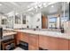 Bathroom featuring double sinks, granite countertops, and modern fixtures at 1401 Wewatta St # 911, Denver, CO 80202
