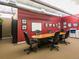 Modern conference room featuring a large table, rolling chairs, and professional decor for meetings at 1401 Wewatta St # 911, Denver, CO 80202