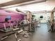 A fitness center equipped with modern cardio machines and weights for resident use at 1401 Wewatta St # 911, Denver, CO 80202