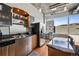 Well-appointed kitchen featuring granite countertops, stainless steel appliances, and ample cabinet space under modern lighting at 1401 Wewatta St # 911, Denver, CO 80202