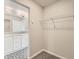 View from a closet showcasing the bathroom and walk-in closet shelving at 523 Beckwourth Ave, Fort Lupton, CO 80621