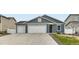 Charming single Gathering home featuring a three-car garage and beautifully painted exterior at 523 Beckwourth Ave, Fort Lupton, CO 80621