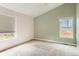 Bedroom with large windows providing lots of natural light at 741 Hallmark Ln, Longmont, CO 80504