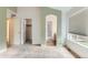 Bright and airy bedroom with a window and access to closet and bathroom at 741 Hallmark Ln, Longmont, CO 80504