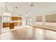 Spacious and airy living room leading to kitchen and backyard at 741 Hallmark Ln, Longmont, CO 80504