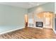 Living room with a fireplace and built-in shelving at 741 Hallmark Ln, Longmont, CO 80504