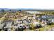 Aerial view of modern townhomes with a view of a lake at 1581 King St, Denver, CO 80204