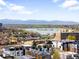 Scenic aerial view of neighborhood with lake and mountain views at 1581 King St, Denver, CO 80204