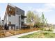 Modern townhome with backyard space, secure fencing, and a well-maintained lawn at 1581 King St, Denver, CO 80204