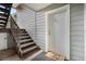 View of the front door and entry with stairs and a welcome mat at 16359 W 10Th Ave # T1, Golden, CO 80401