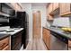Well-lit kitchen with stainless steel appliances and light wood cabinetry at 16359 W 10Th Ave # T1, Golden, CO 80401