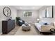 Cozy living room features modern decor, wood floors, and bright natural light at 16359 W 10Th Ave # T1, Golden, CO 80401