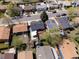 An aerial view shows a neighborhood with a mix of one-story homes and well-maintained yards at 2433 E 90Th Ave, Thornton, CO 80229