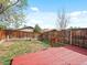 The spacious back yard features a deck and wood fence, perfect for outdoor enjoyment and privacy at 2433 E 90Th Ave, Thornton, CO 80229
