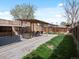 Backyard featuring a covered patio area perfect for outdoor dining and relaxing with a fenced yard at 2433 E 90Th Ave, Thornton, CO 80229