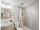 Clean bathroom featuring a tiled shower with dual shower heads, updated fixtures, and a modern vanity at 2433 E 90Th Ave, Thornton, CO 80229